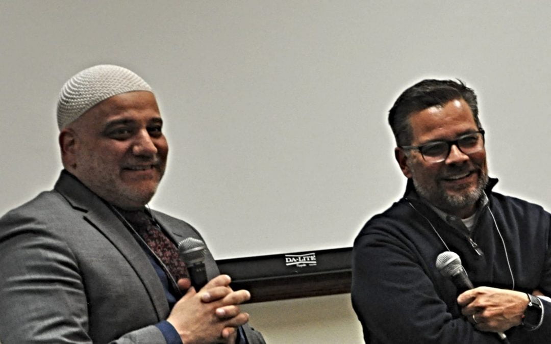 Imam Imad Enchassi and Mitch Randall laughing together