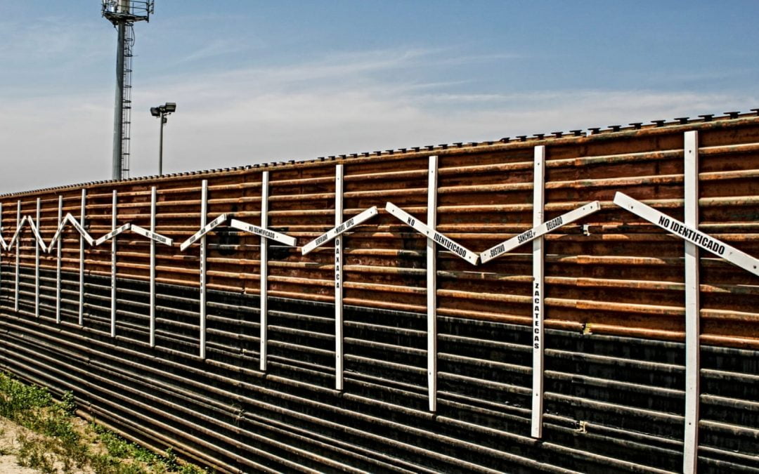 A metal border wall