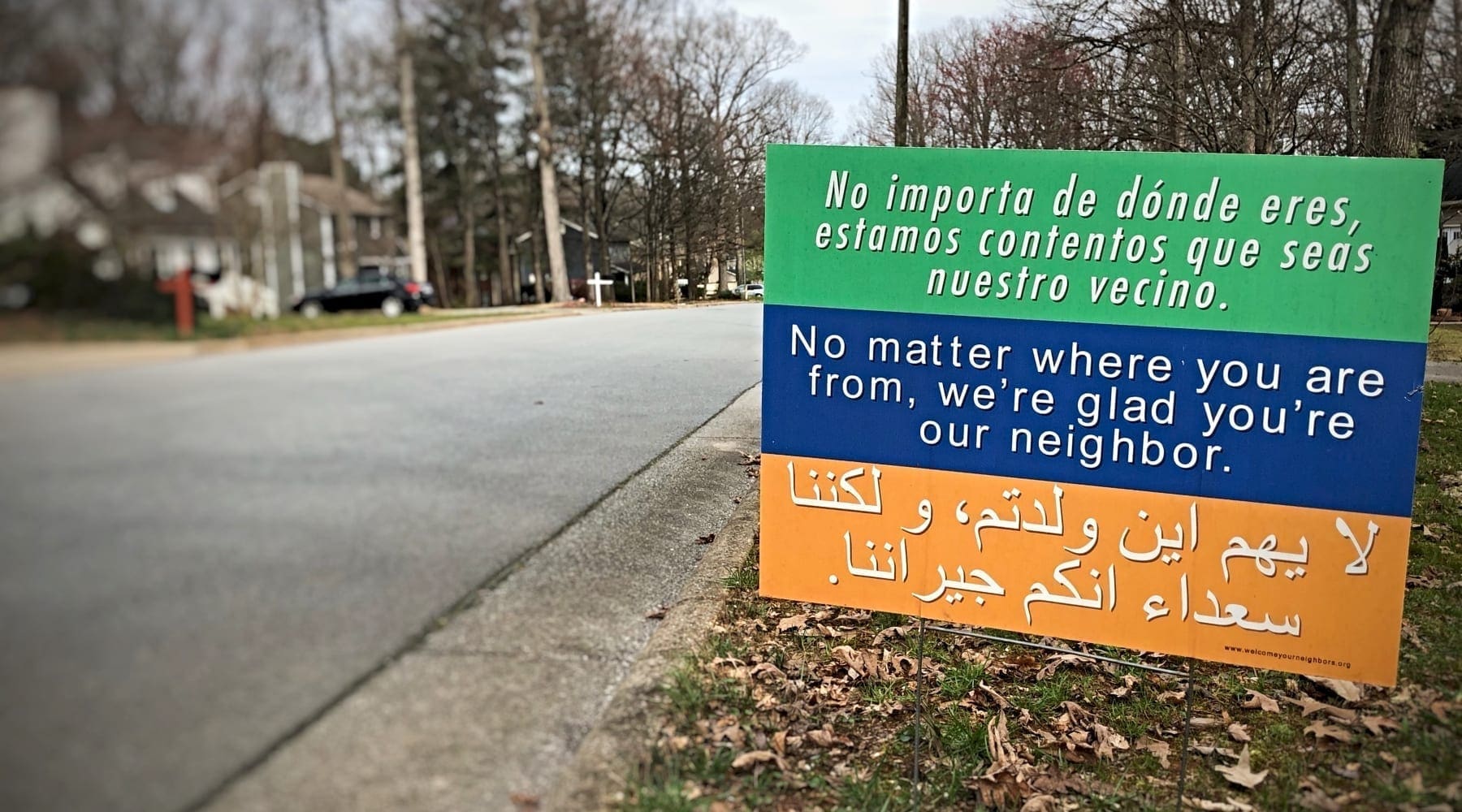 Neighborhood sign welcoming all neighbors