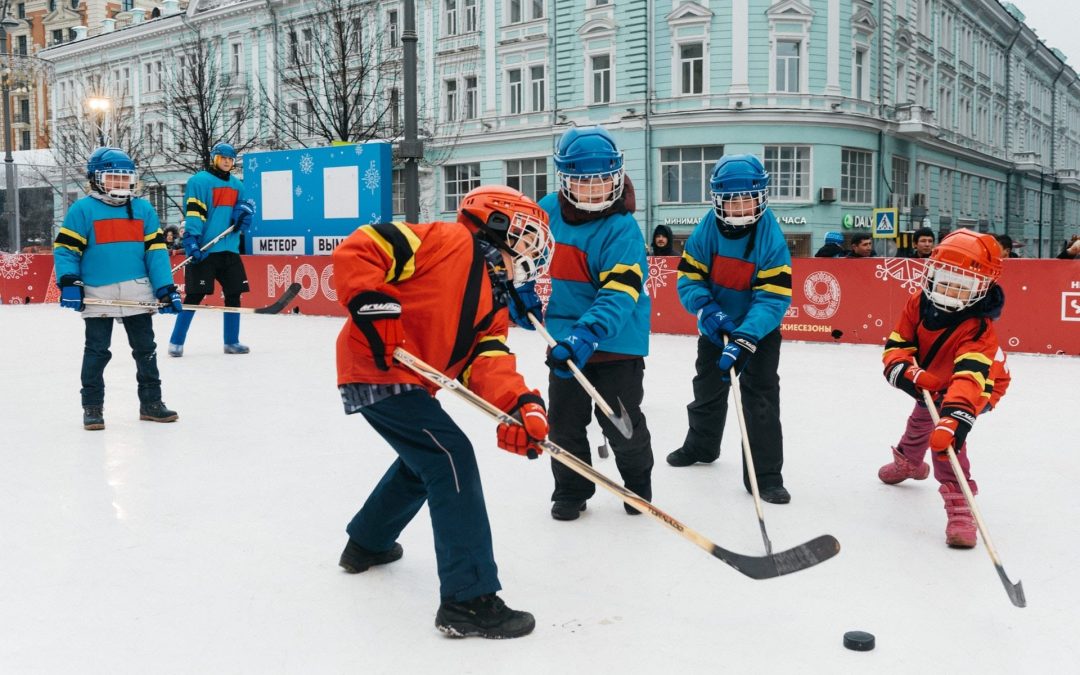 Boys playing ice hockey