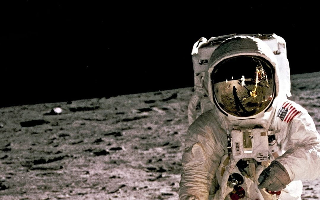 Astronaut on surface of the moon