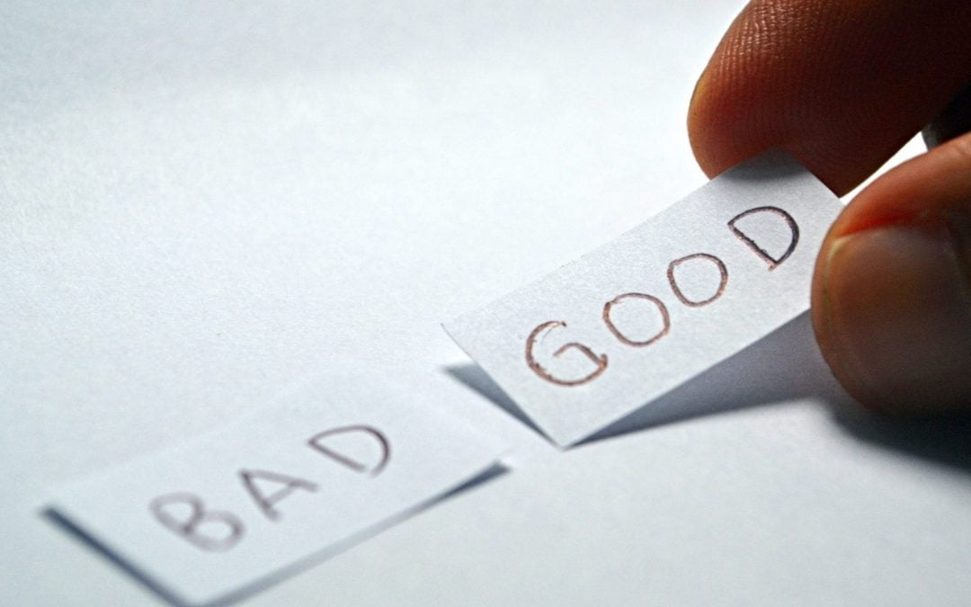 Two slips of paper with ‘bad’ and ‘good’ written on them