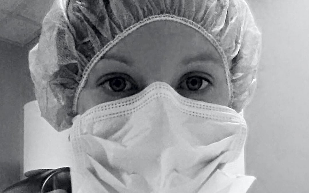 Health care worker wearing surgical mask
