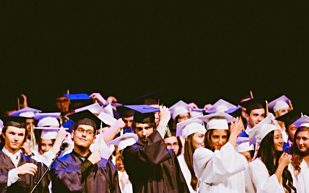 Rows of graduates in caps and gowns