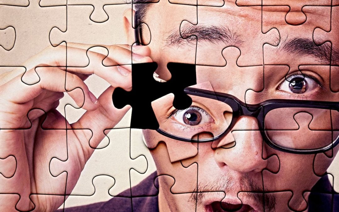 Nearly complete puzzle of surprised man’s face