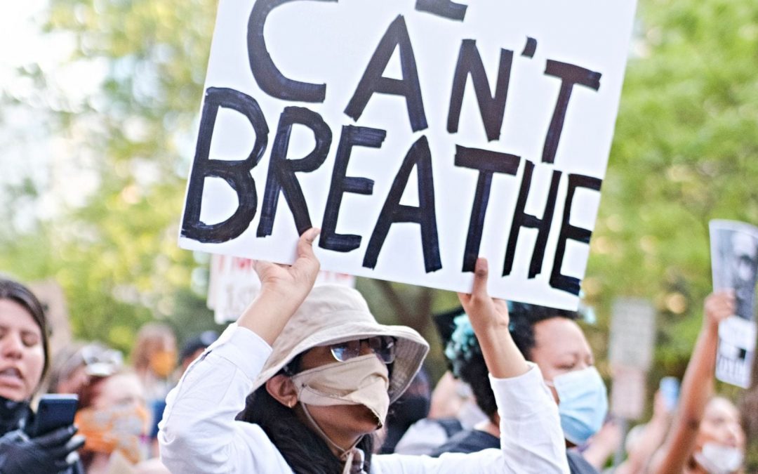 Protester marching with I can’t breathe sign