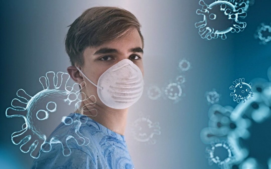 Male student wearing masks with images of coronavirus around him