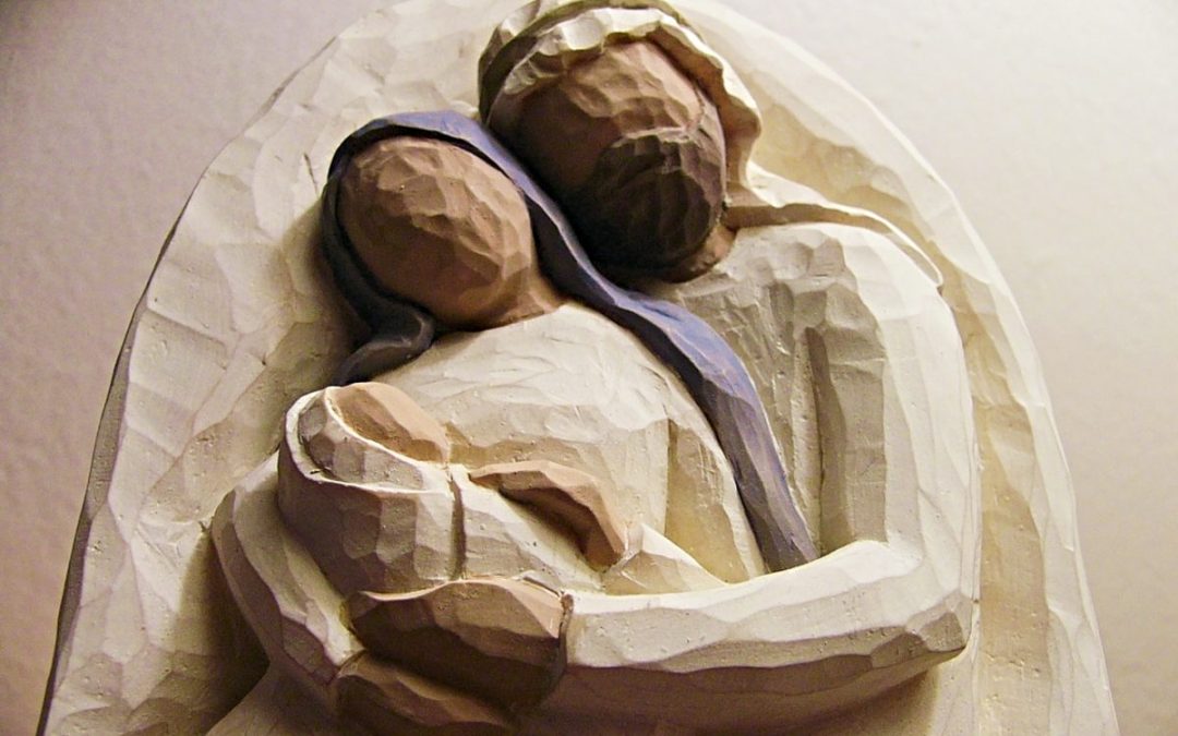 Sculpture of mother holding child