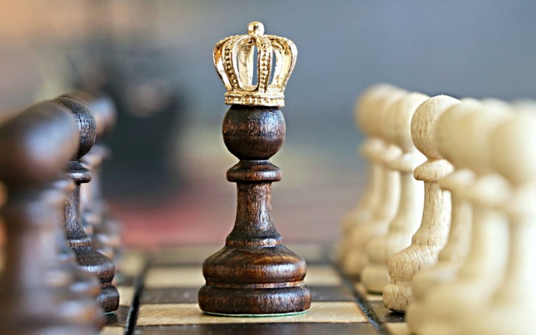 King with crown on chess board