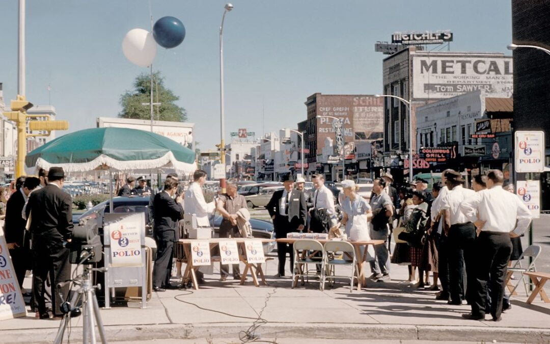 People standing in line waiting for a polio vaccine sometime in the late 1950s to early 1960s.