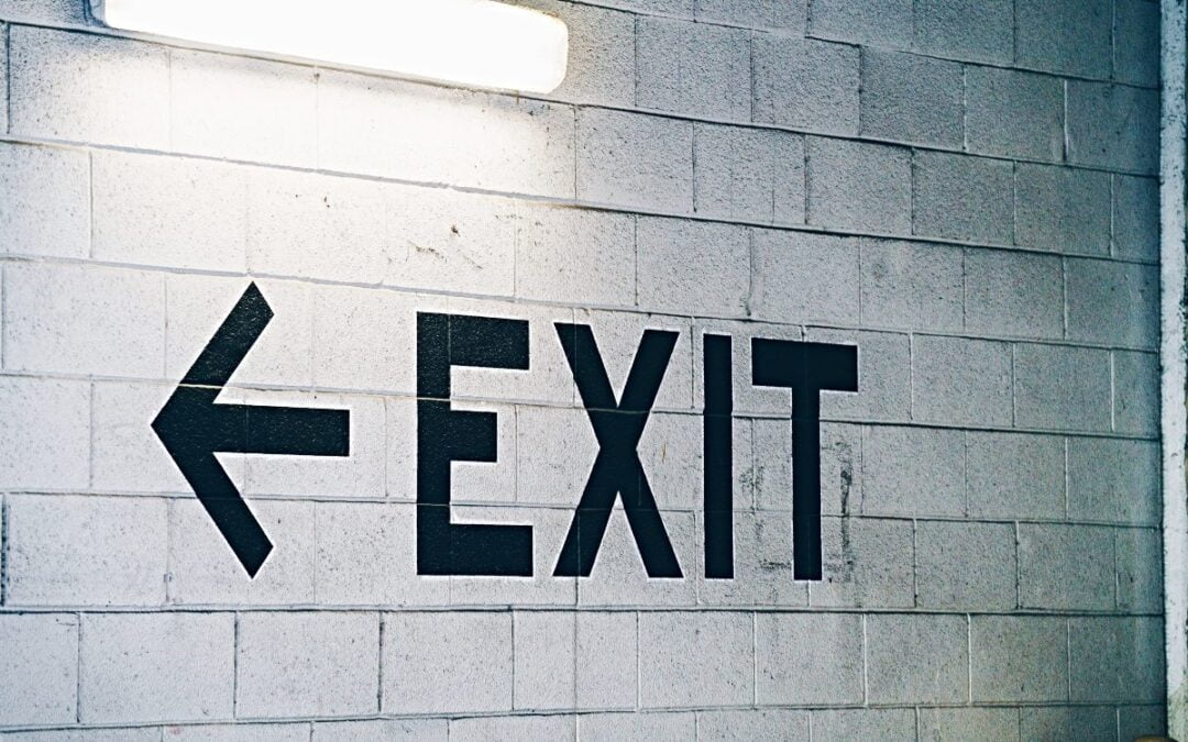 Exit sign painted on wall