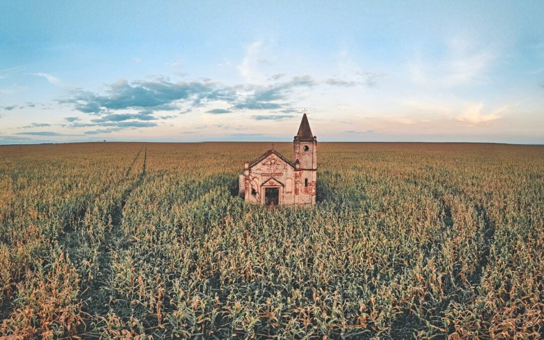 Church building in middle of cornfield