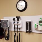 Medical equipment on the wall in a doctor’s office.
