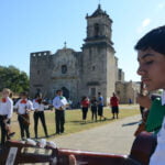 A Mariachi band performing a ceremony in San Antonio, Texas, at the dedication of the Spanish colonial missions in San Antonio Missions National Historical Park.
