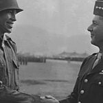 Lt. Ernest Childers, a Muscogee Creek, being congratulated by Gen. Jacob L. Devers after receiving the Congressional Medal of Honor in Italy.