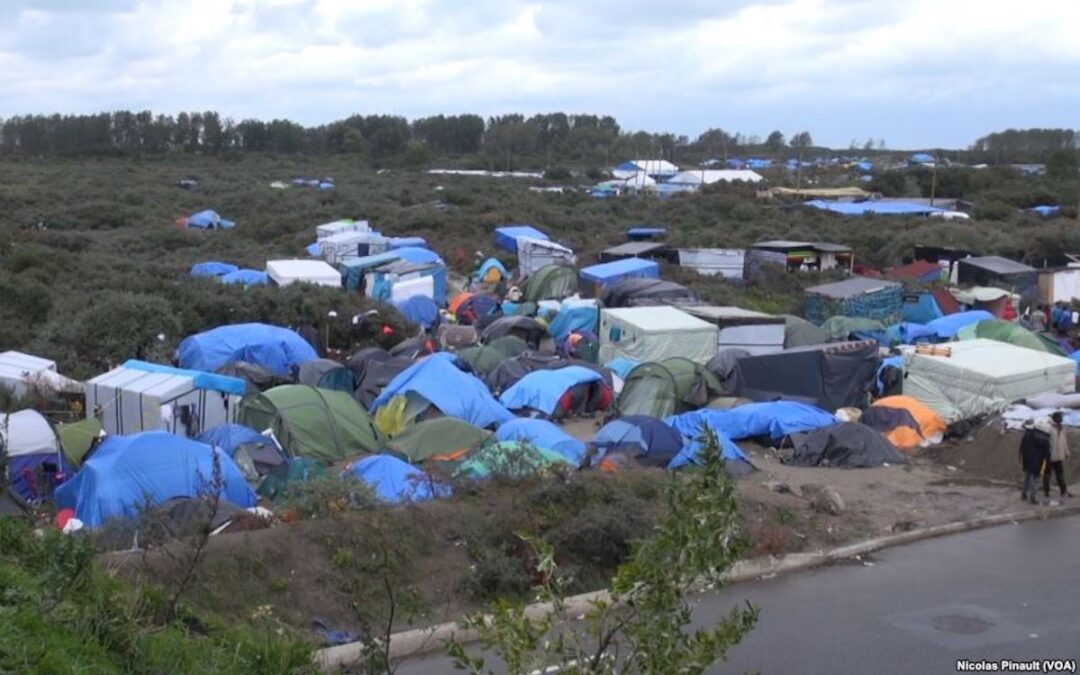 A group of tents and makeshift shelters put up by migrants in a section of Calais, France, in 2015 that was labeled the “jungle.”