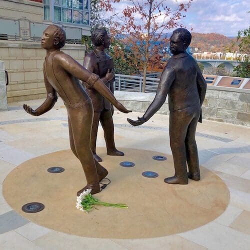 A memorial in Chattanooga, Tennessee, with three statues standing together.