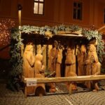 A wooden outdoor nativity scene.