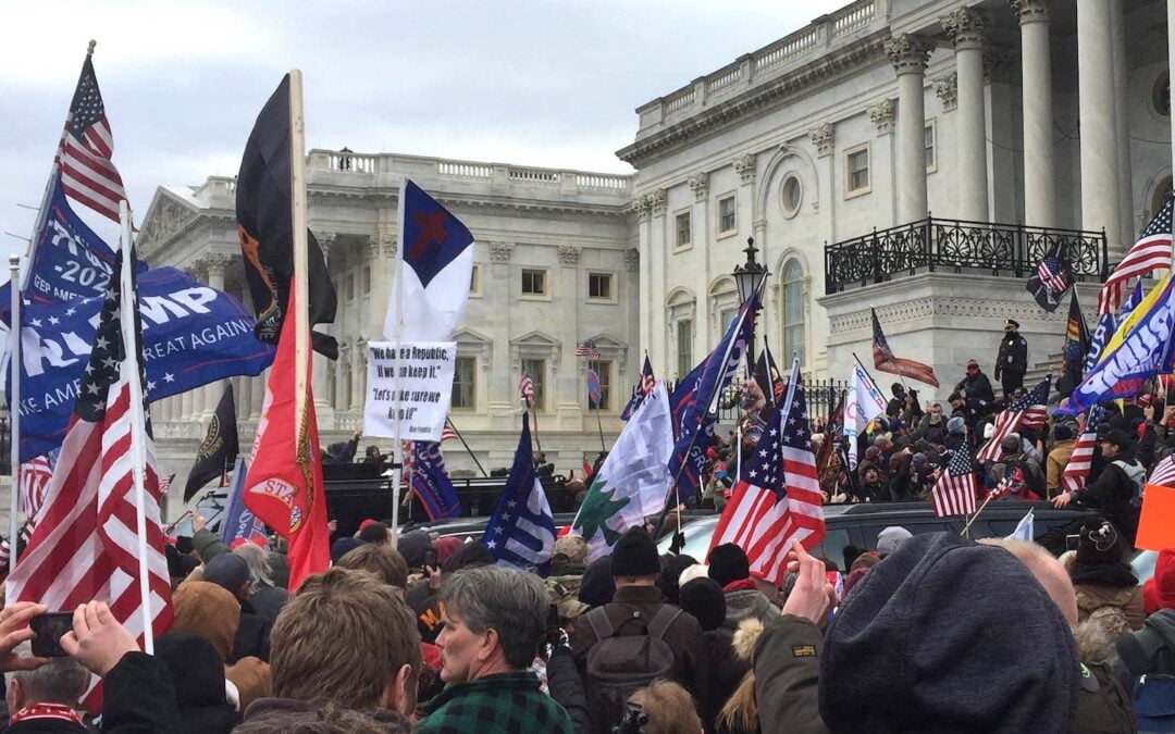 A Christian flag in the middle of the crowd outside the U.S. Capitol on Jan. 6, 2021.