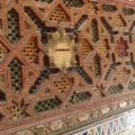 A slot for giving zakat at the Zaouia Moulay Idriss II in Fez, Morocco.