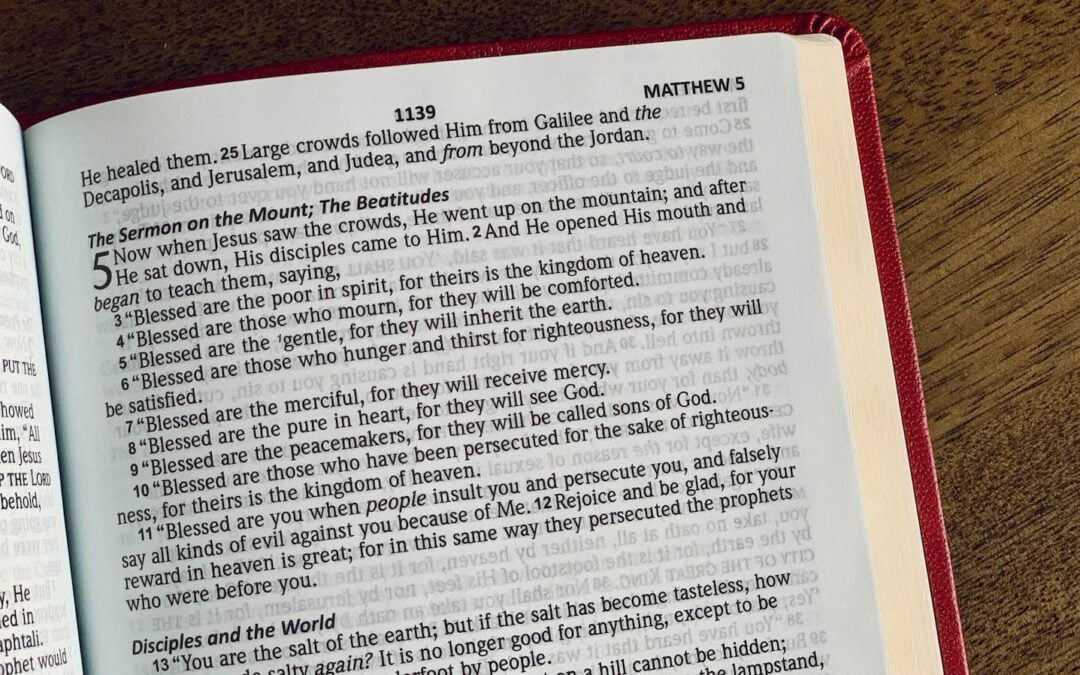 A Bible open to Matthew 5.