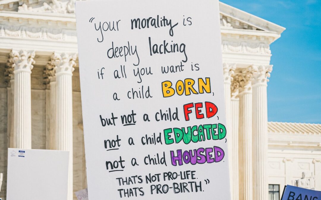 A sign held during a demonstration outside the U.S. Supreme Court building.