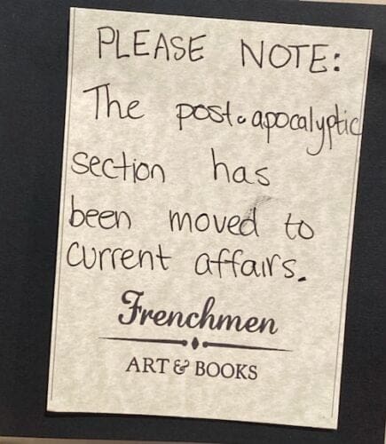 A paper sign on a bookstore.