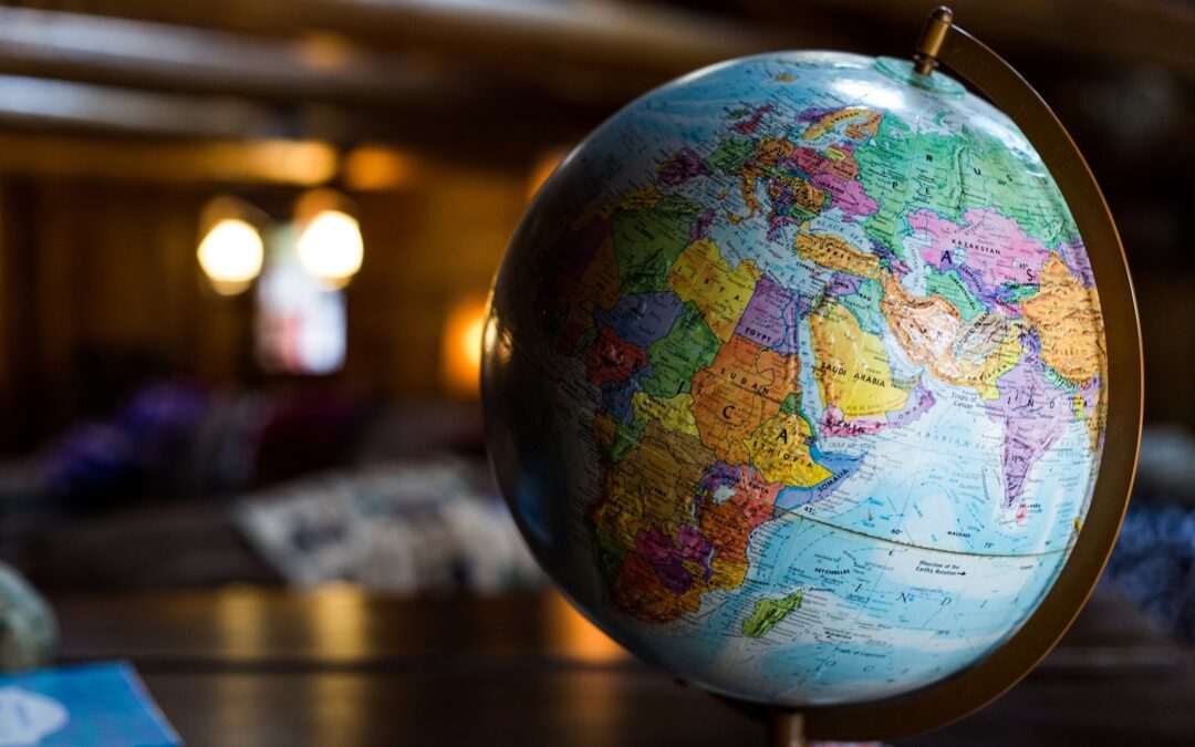 A globe sitting on a table with the African continent visible.