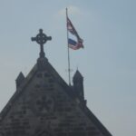 Flags of the United Kingdom and the United States flying on St. James' Church, Wetherby, West Yorkshire, on May 19, 2018.