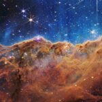 The “Cosmic Cliffs” in the Carina Nebula, a NIRCam Image taken by the James Webb Space Telescope.