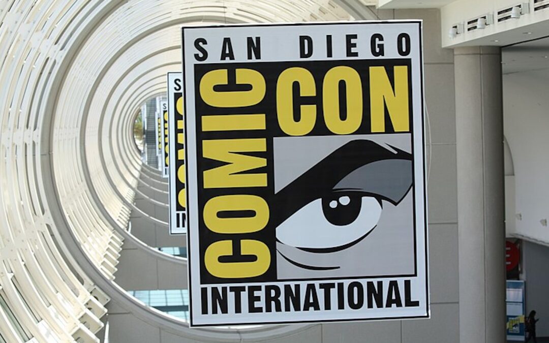 A Comic-Con sign displayed in a convention center.