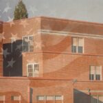 A red brick school building with an American flag overlay.
