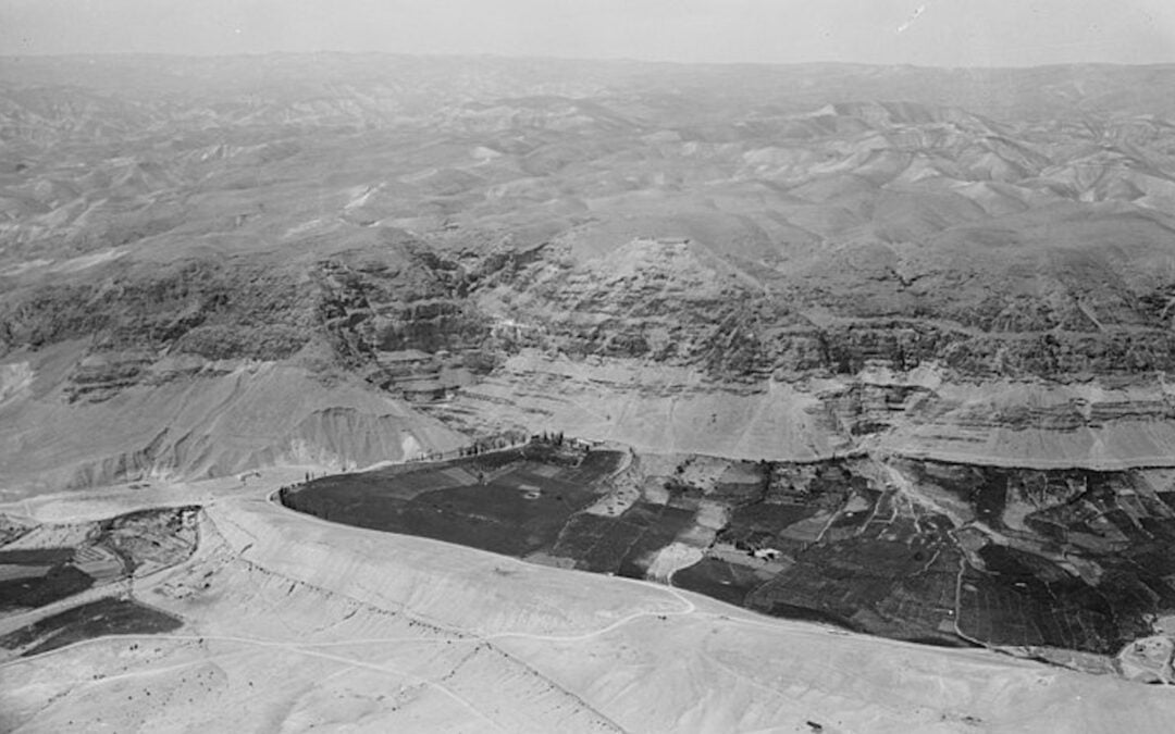 A black-and-white photograph of the wilderness of Judea and Mount of Temptation.
