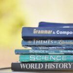 A stack of books on various subjects, including science, history and grammar.