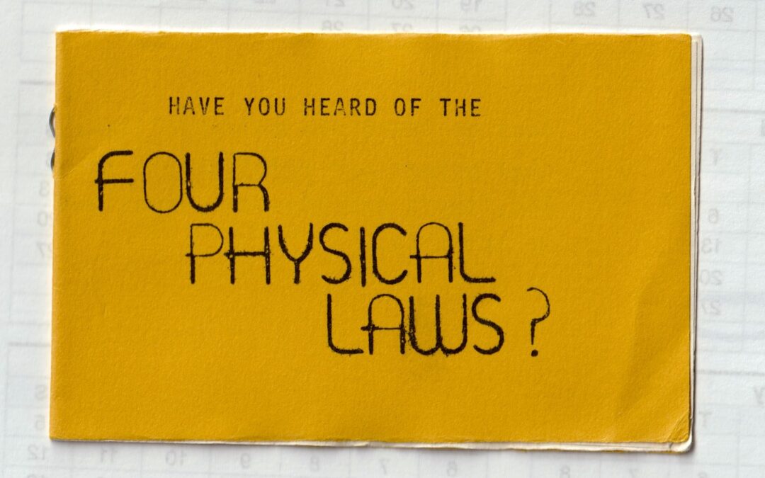A yellow-orange document with the words, “Have you heard of the four physical laws?” printed in black lettering on it.