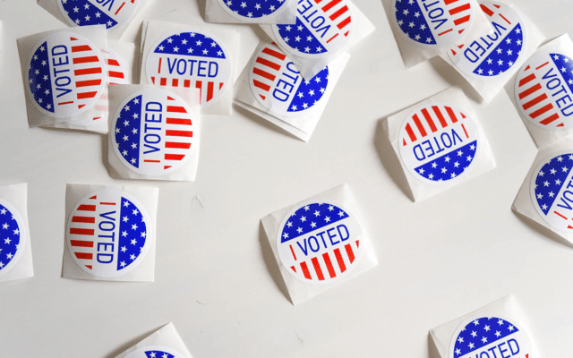 A roll of stickers that each say, “I voted.”