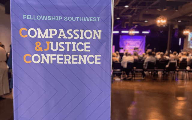 A conference sign at Life in Deep Ellum in Dallas, Texas, that reads, “Fellowship Southwest Compassion & Justice Conference.”