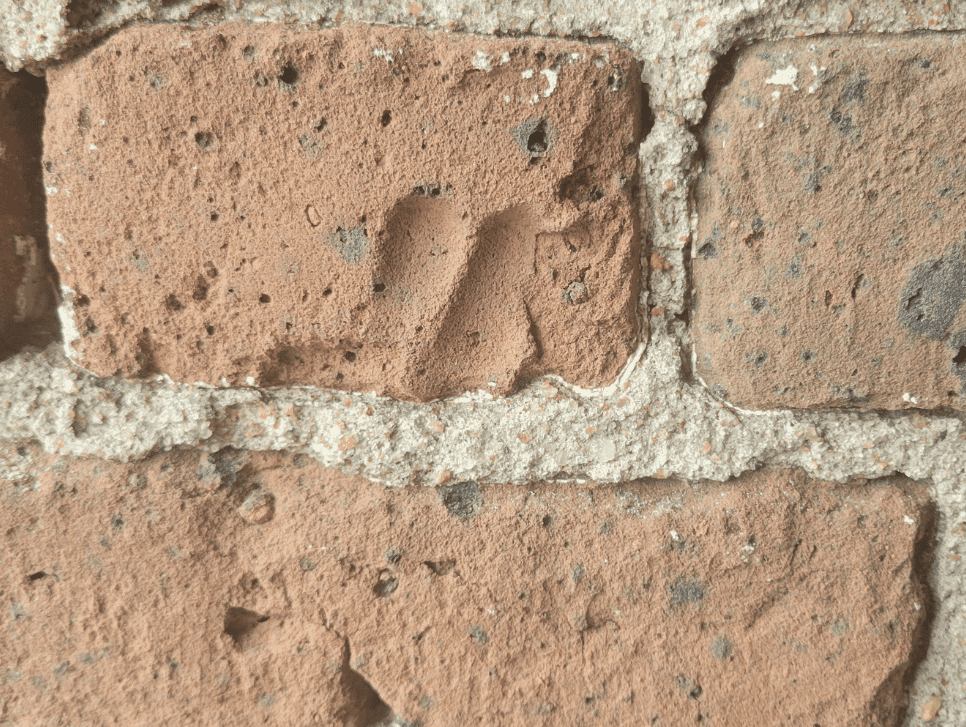 A brick with the fingerprint of an enslaved laborer at Ft. Sumter.
