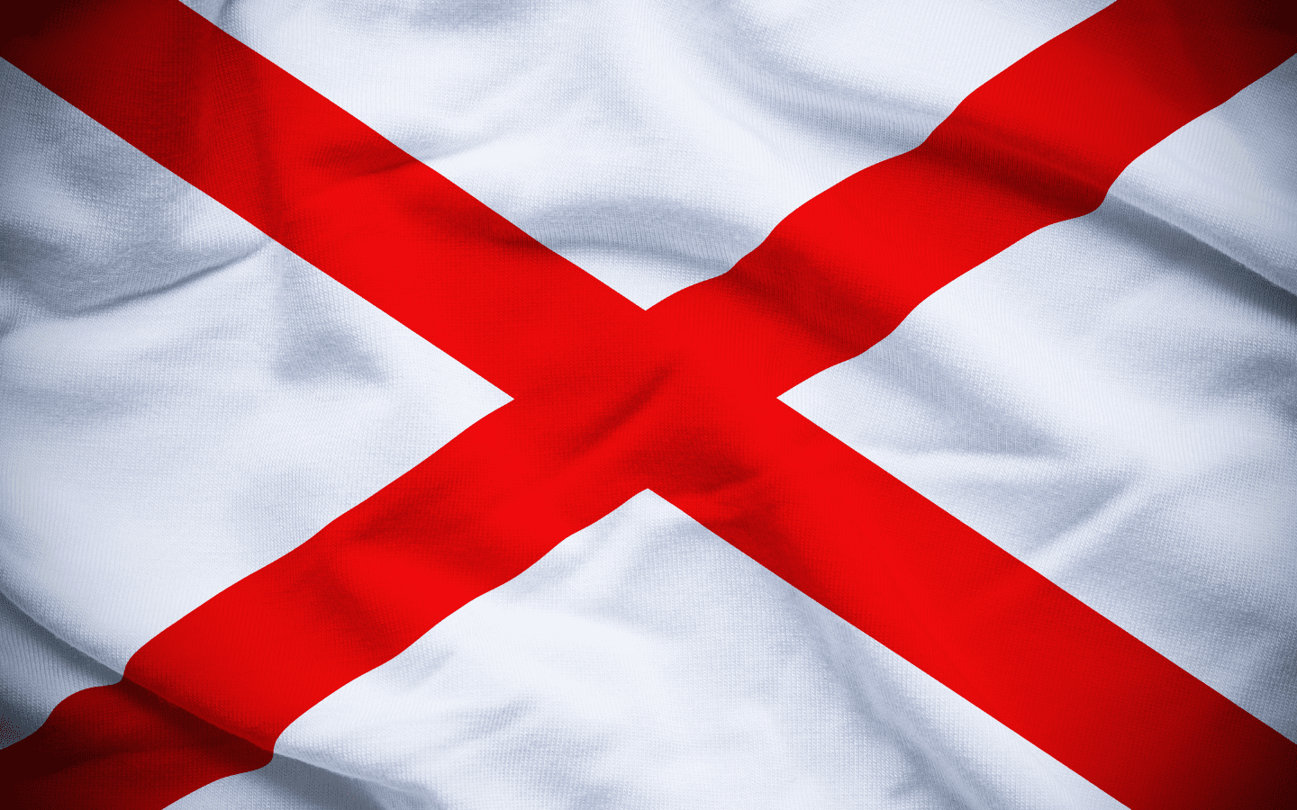 A ruffled state flag of Alabama.