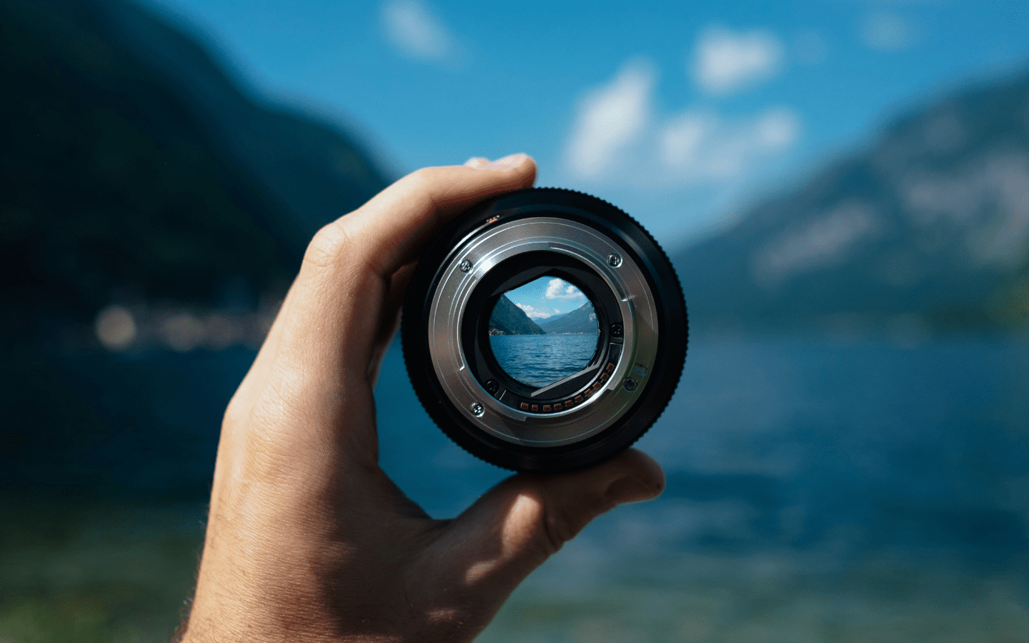 A camera lens forced on a distant landscape.