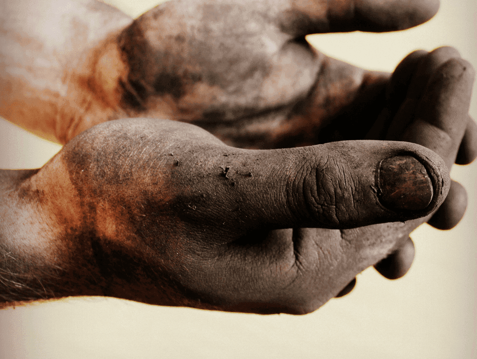 Two dirty hands held out.