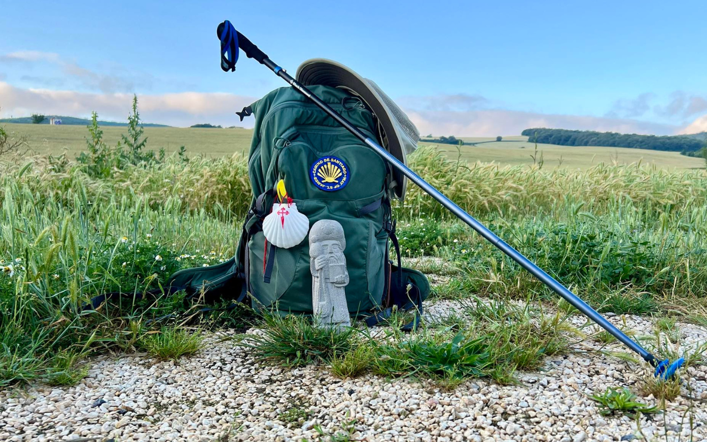 A pilgrim’s backpack and walking pole on the El Camino France.
