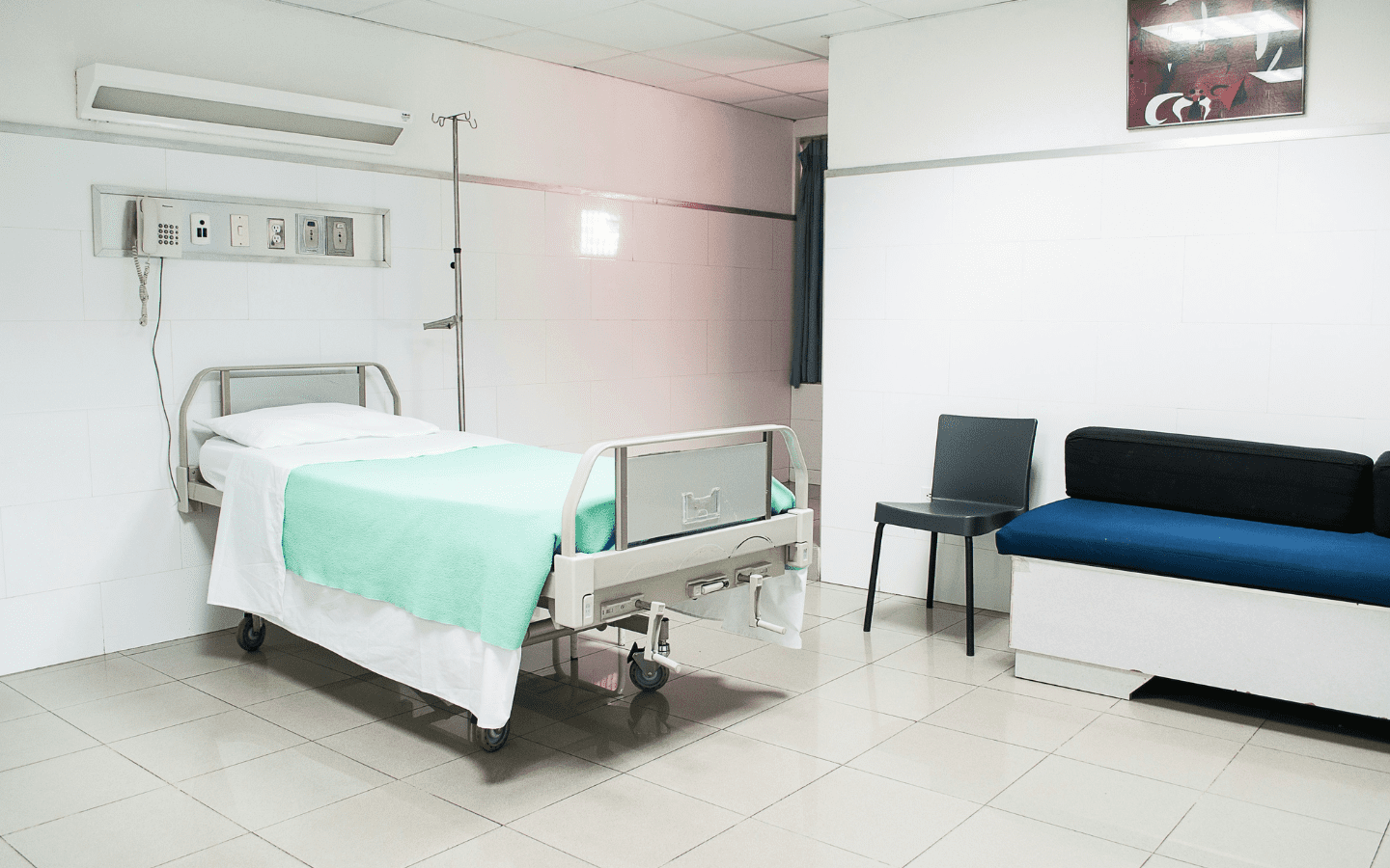 A photo of an empty hospital room.