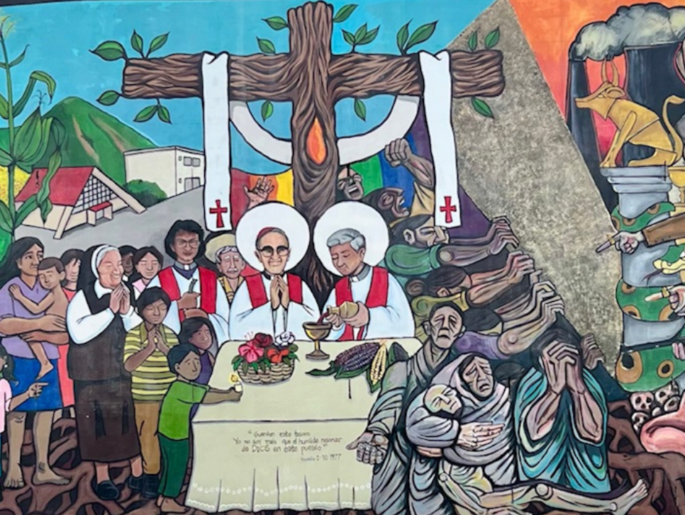 A mural featuring Oscar Romero presiding over the Eucharist.|