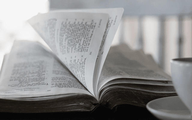 A Bible opened on a table.