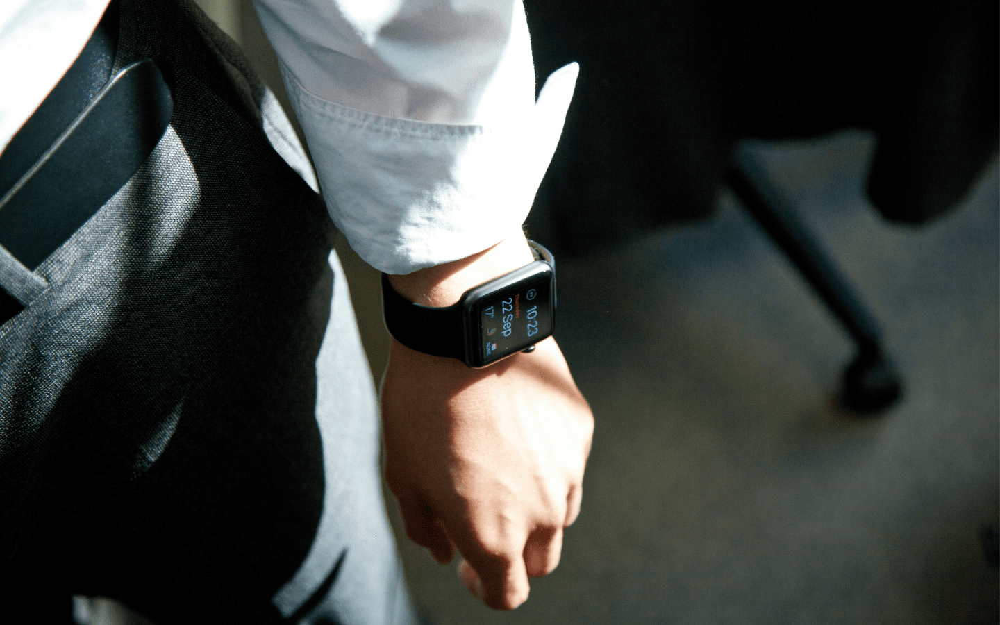 A man with a smartwatch on his wrist.