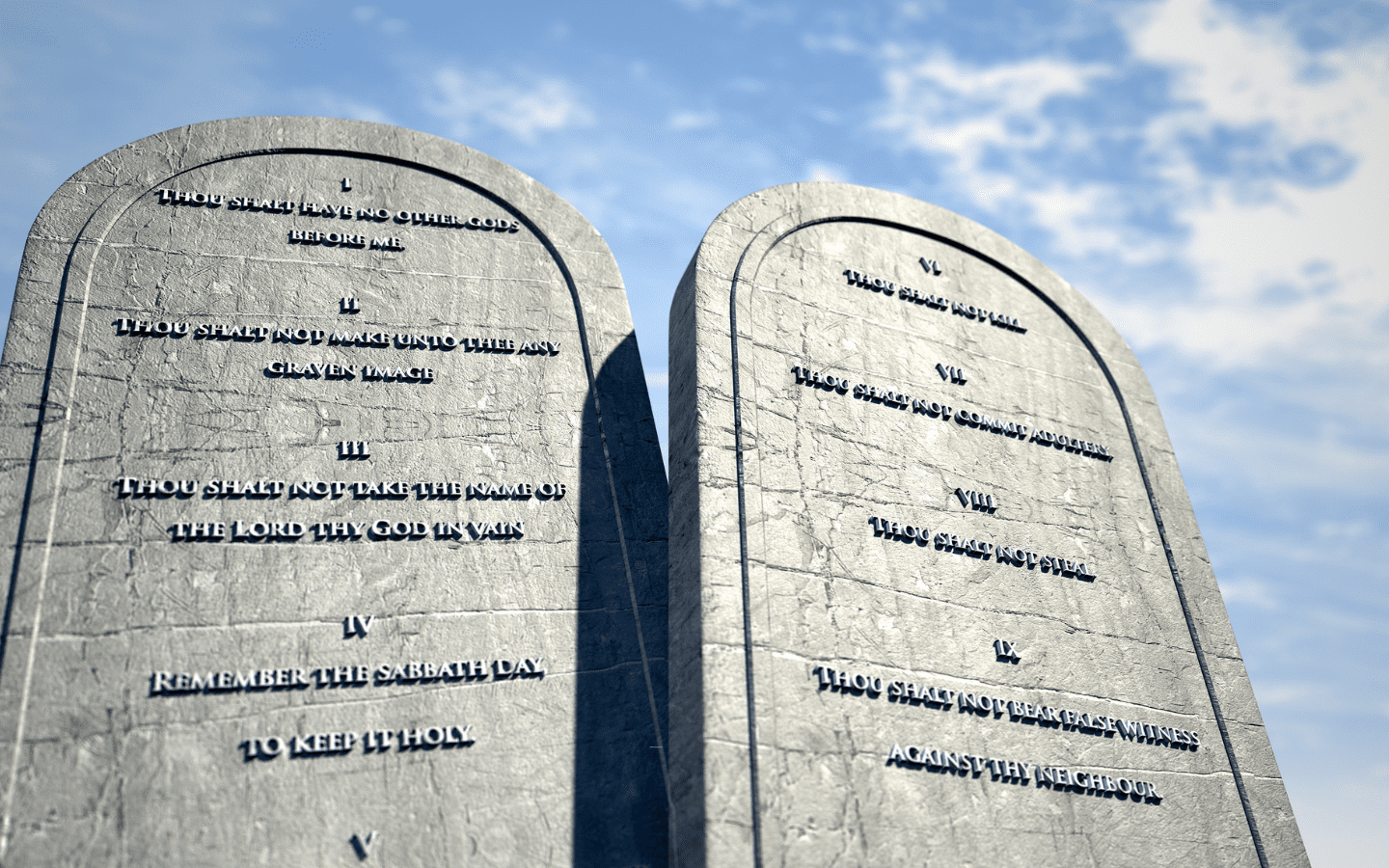 A photo of a replication of the Ten Commandments in stone.