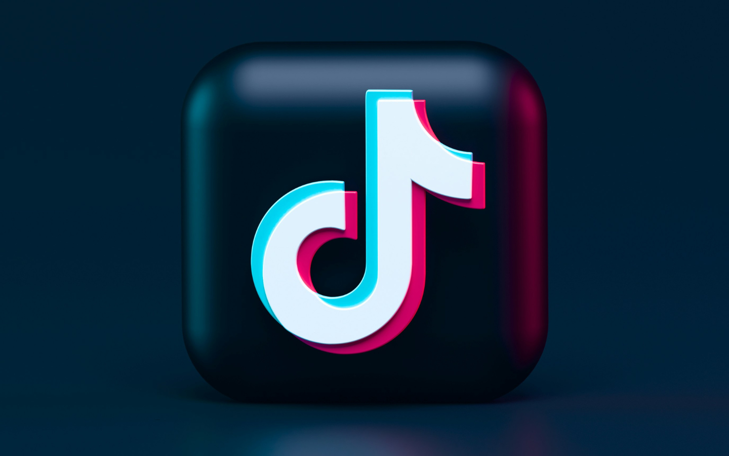 A blurred TikTok logo.