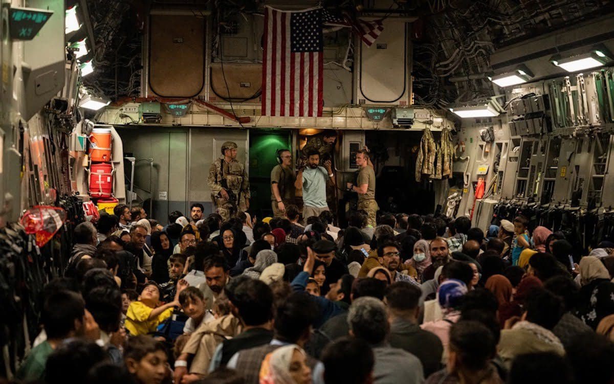 Afghan refugees on a U.S. military plane.