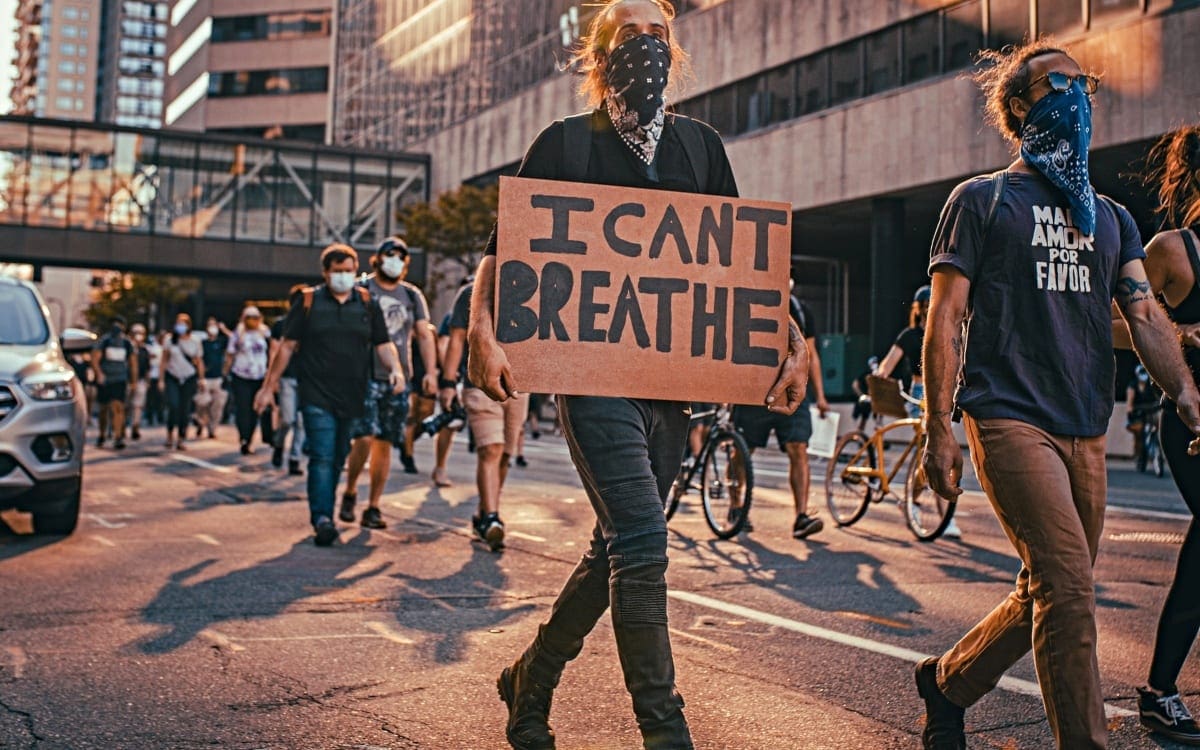 Protester marching with I Can’t Breathe sign